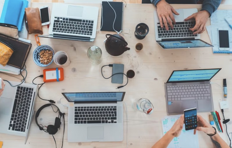 a group of computers on a table