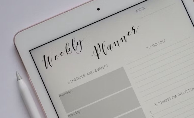 an image of a weekly planner on a table