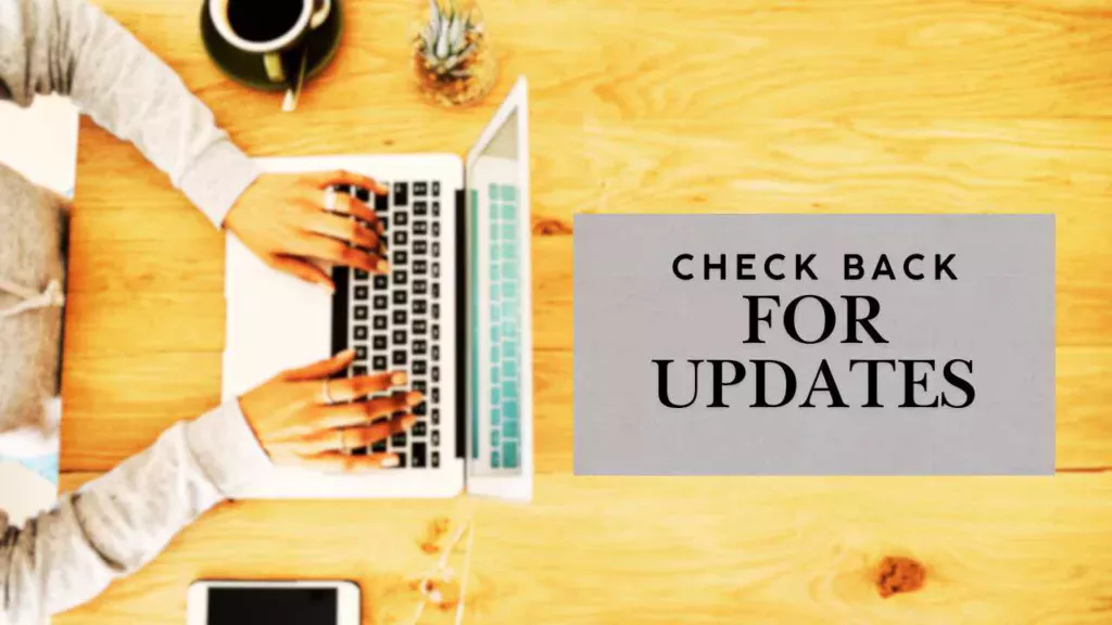 a person typing on a computer next to a graphic that says check back for updates