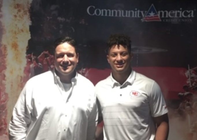 KC REALTOR® Joe Stephenson taking a photo with Patrick Mahomes