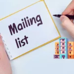 a person writing mailing list on a paper