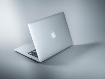 a macbook pro on a table